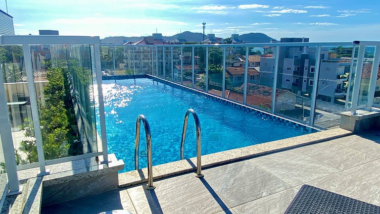 Sol e praia c/ piscina em apto iluminado c/conforto