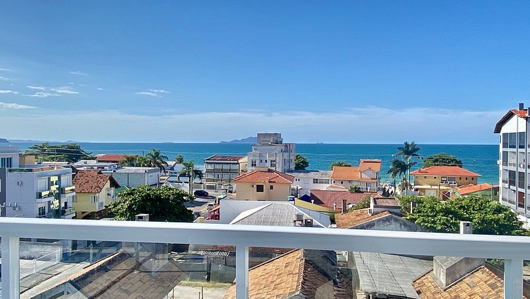 Passos da praia c/ piscina apto iluminado e novo