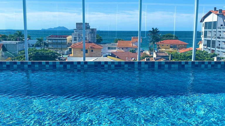 Sol e praia c/ piscina em apto iluminado c/conforto