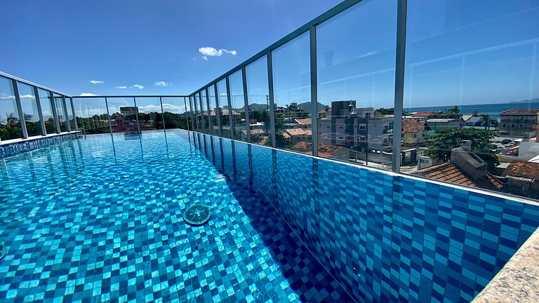 Sol e praia c/ piscina em apto iluminado c/conforto