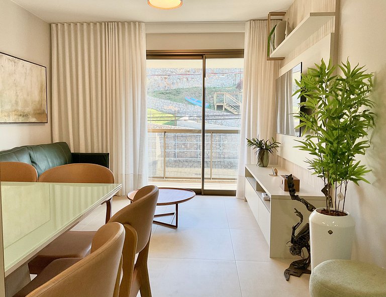 Estilo e conforto apê em residencial beira-mar