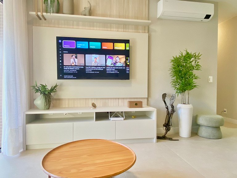 Estilo e conforto apê em residencial beira-mar