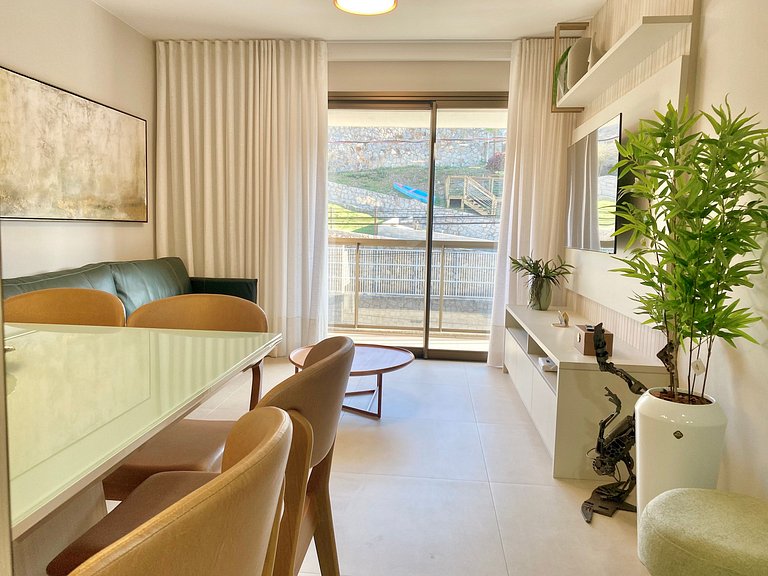 Estilo e conforto apê em residencial beira-mar