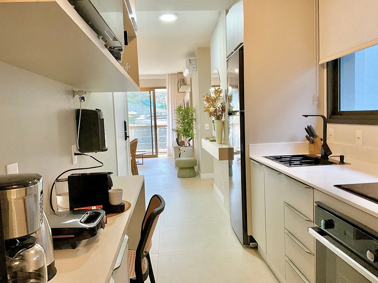 Estilo e conforto apê em residencial beira-mar