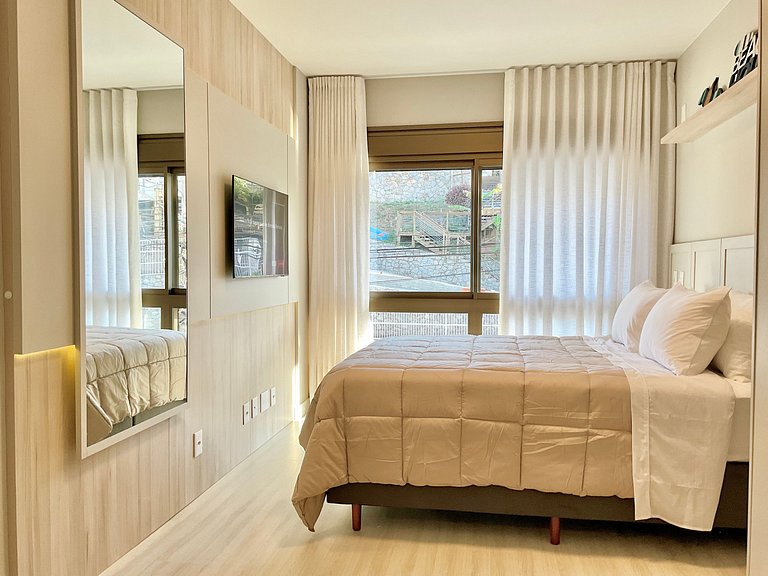 Estilo e conforto apê em residencial beira-mar