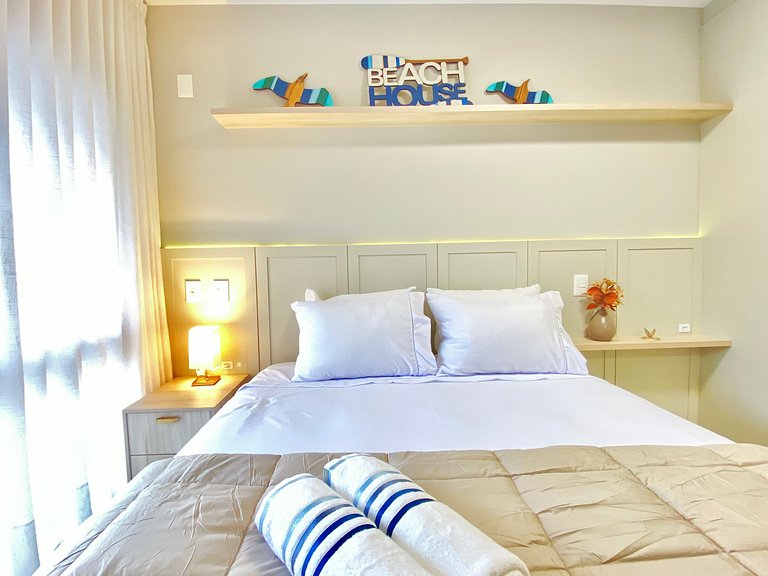 Estilo e conforto apê em residencial beira-mar