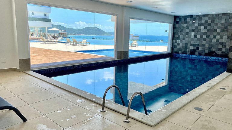 Você na praia c/ Vistas e Piscinas deslumbrantes