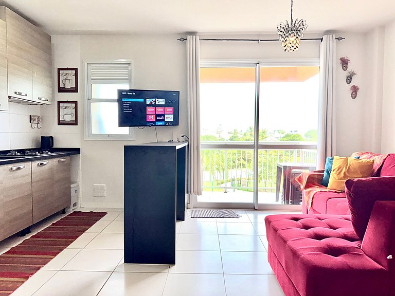 Relaxe nesse apê na praia e c/ piscina