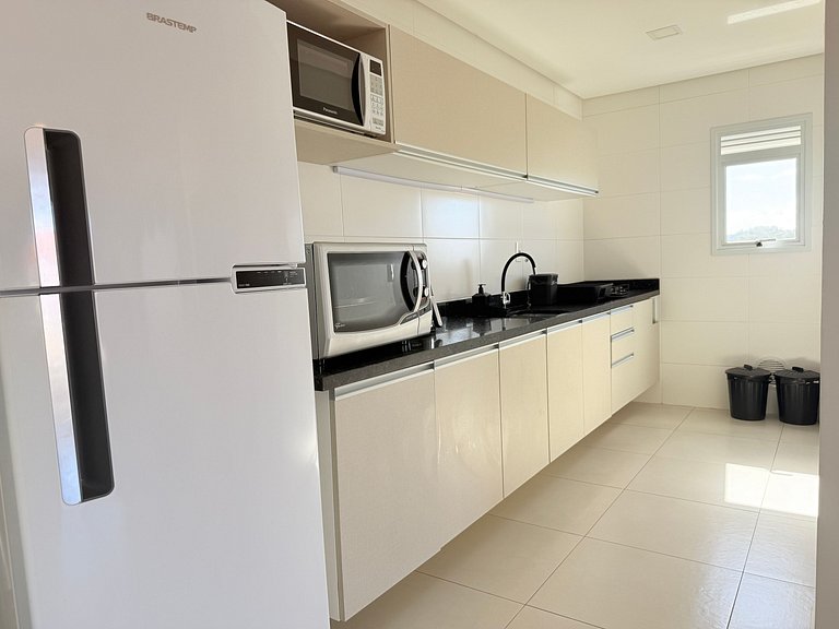 Vista incrível do mar + piscina e praia pertinho