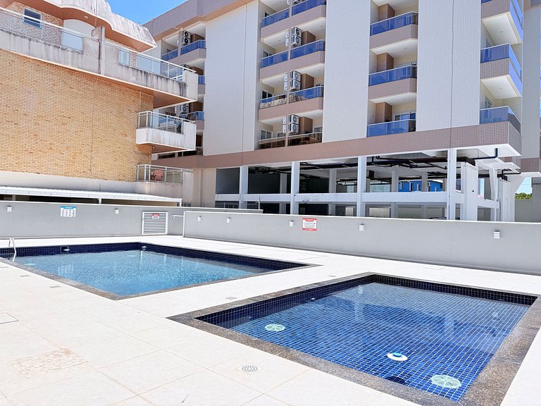 Aconchego com Vista da piscina ,1 quarto, pertinho do mar!